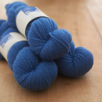 Doulton Blue 4ply yarn, bright mid-blue shade from rare breed Border Leicester sheep