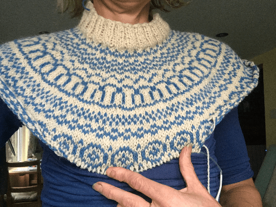 Woman wearing Aran yoked woolen Sweater knitting kit made from Border Leicester Yarn