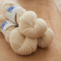 Sheep 4ply yarn, undyed and natural shade in our range of Yorkshire-inspired colours. Provides a clean background.
