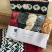 Yorkshire Christmas pack of 4ply mini skeins contains 5 20g/60m skeins of yarn in deep green, rich red, golden yellow, silver grey and ivory