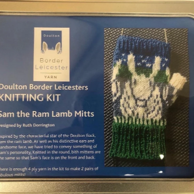 Sam the Ram Lamb Mitts Knitting Kit in a rectangular hinged-lid tin. Perfect gift for knitters.