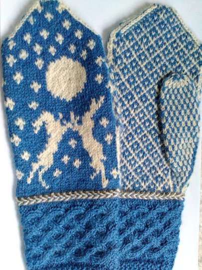 Doulton Hares Mittens, cable and stranded knitting with Latvia braid trim. In two colours of rare breed, slaughter-free yarn.