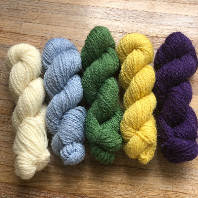 Yorkshire Spring pack of 4ply mini skeins, 20g each, in a pack 5 shades of ivory, pale blue, grass green, yellow and purple