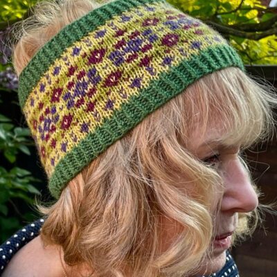Woman wearing woolen headband knitting kit made from border leicester yarn