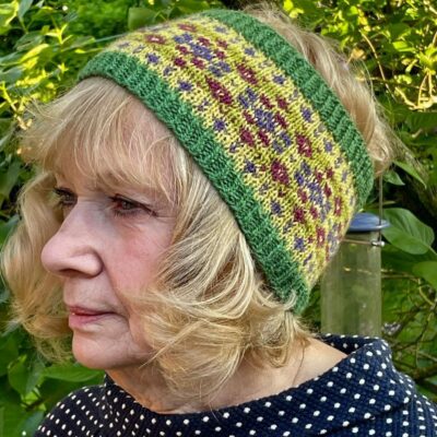 Woman wearing woolen headband knitting kit made from border leicester yarn
