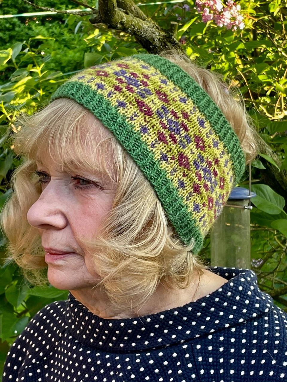 Woman wearing woolen headband knitting kit made from border leicester yarn