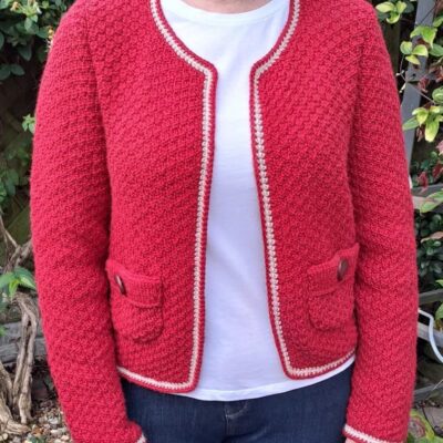 Woman wearing woolen jacket knitting kit made from border leicester yarn