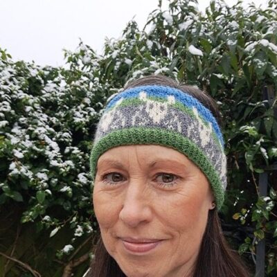Woman wearing woolen headband knitting kit made from border leicester yarn