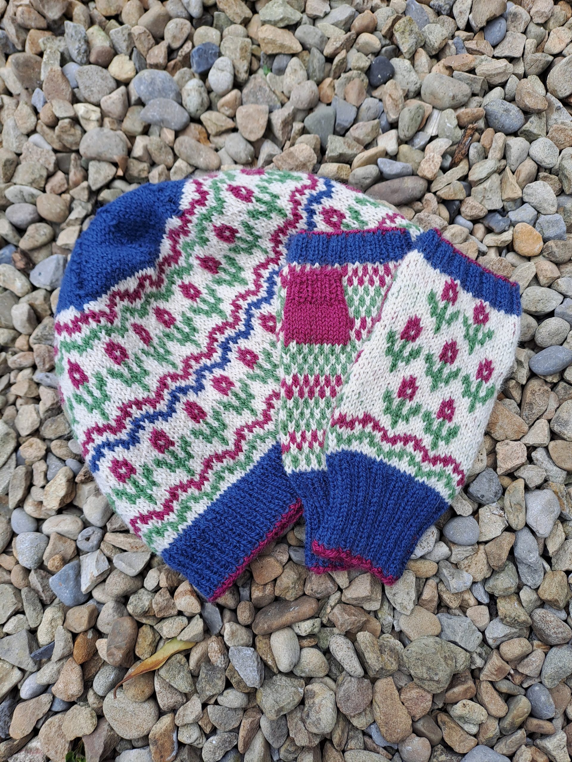Yorkshire Blooms Toque and Fingerless Mitts knitted using rare-breed yarn from a slaughter-free flock